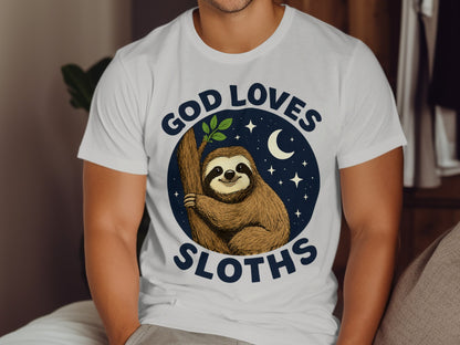 T-shirt with a smiling sloth on a branch under a crescent moon and stars.