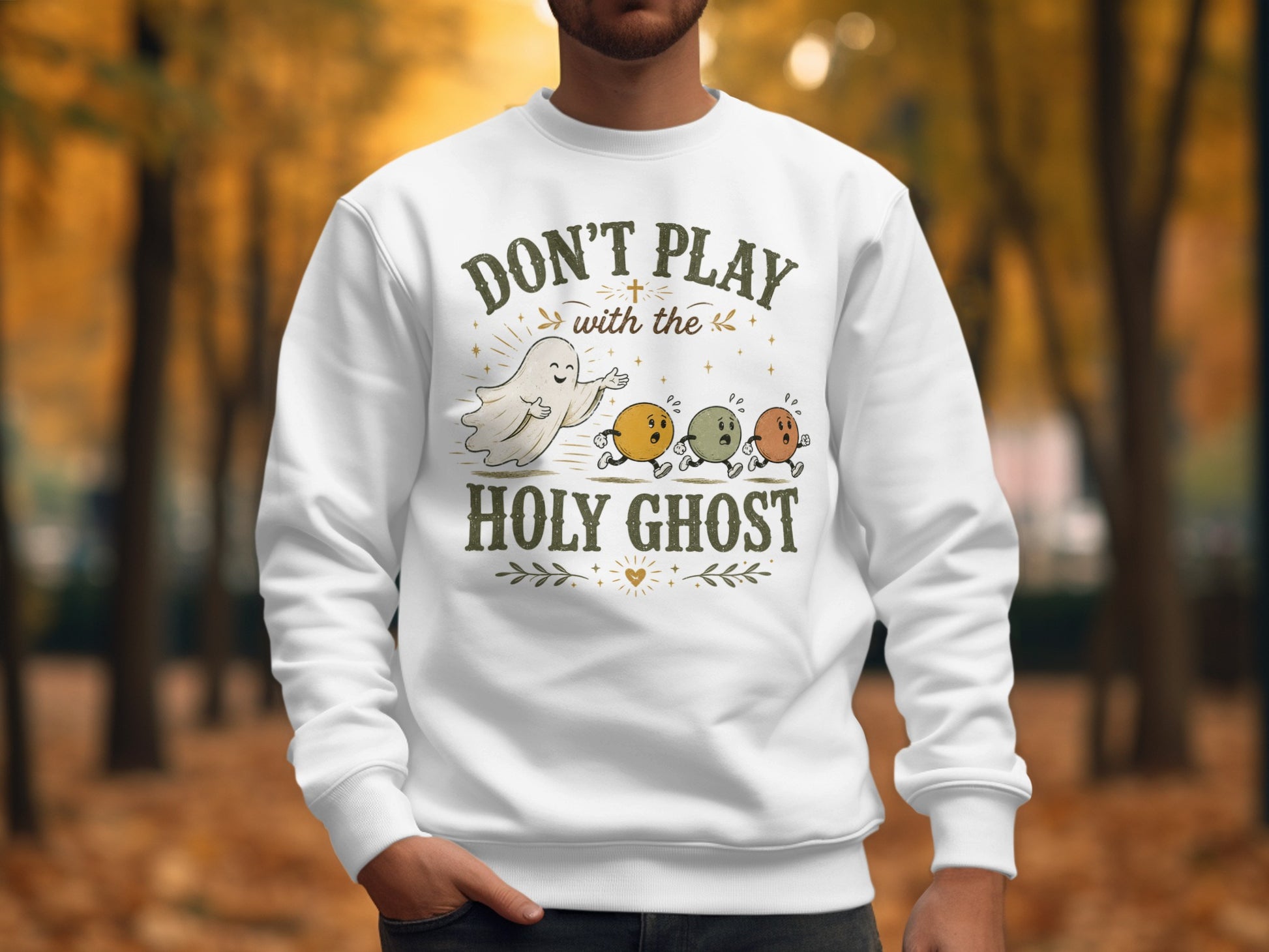 Crewneck sweatshirt with "Don't play with the Holy Ghost" and ghost illustration.