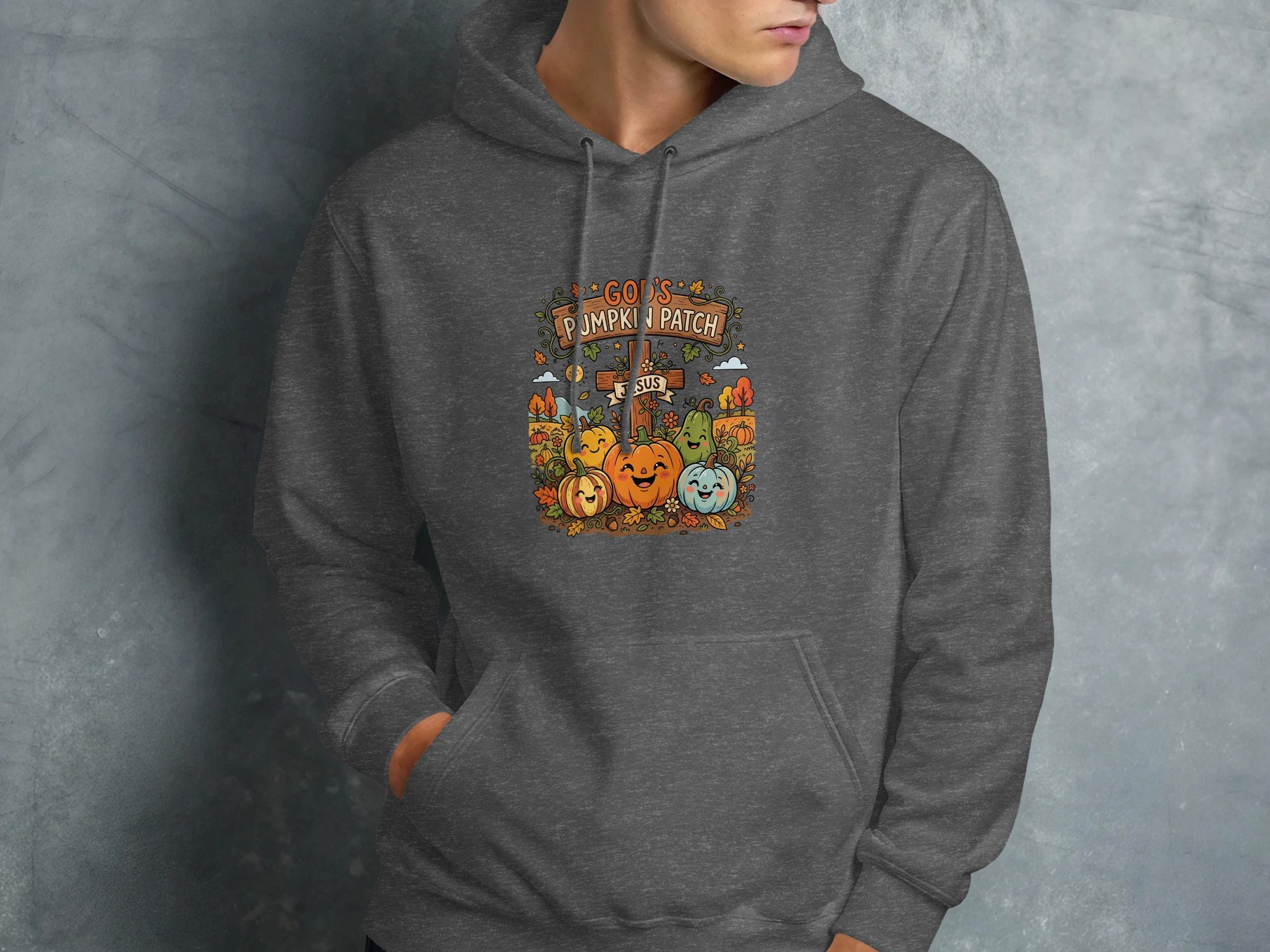 Dark gray hoodie with "God's Pumpkin Patch" text and cartoon pumpkins.
