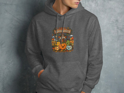 Dark gray hoodie with "God's Pumpkin Patch" text and cartoon pumpkins.