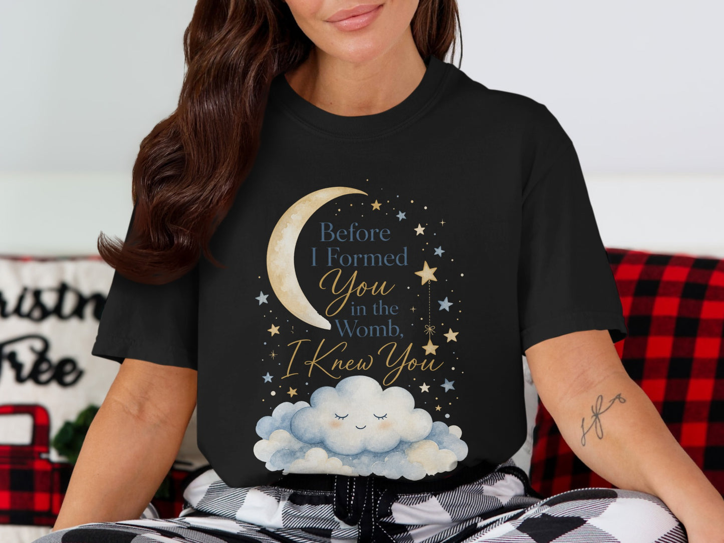 Black t-shirt with moon, stars, and cloud graphic with text "Before I Formed You in the Womb, I Knew You".