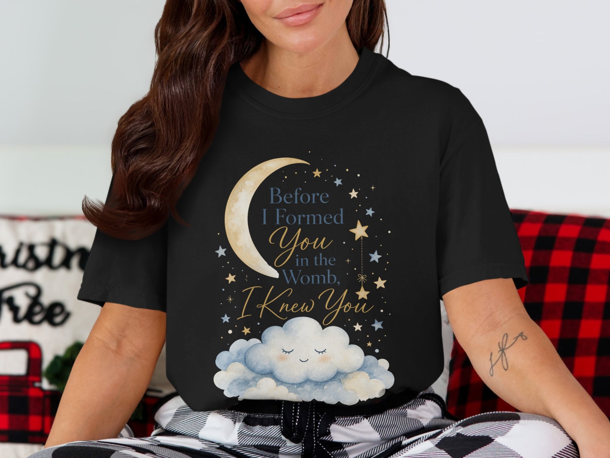 Black t-shirt with moon, stars, and cloud graphic with text "Before I Formed You in the Womb, I Knew You".