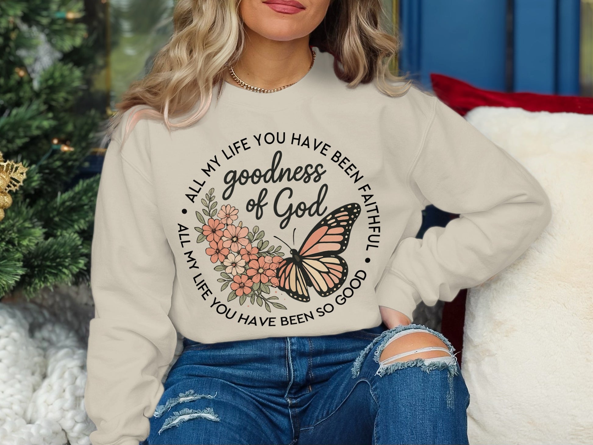 Cream sweatshirt with butterfly and text "goodness of God" and "All my life you have been faithful."