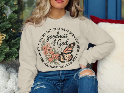 Cream sweatshirt with butterfly and text "goodness of God" and "All my life you have been faithful."