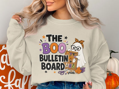 Crewneck sweatshirt featuring a ghost with glasses holding a "Boo Bulletin Board" sign.
