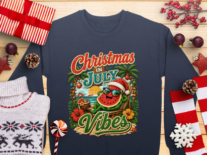 Christmas in July Vibes graphic on a navy blue sweatshirt with festive decorations.