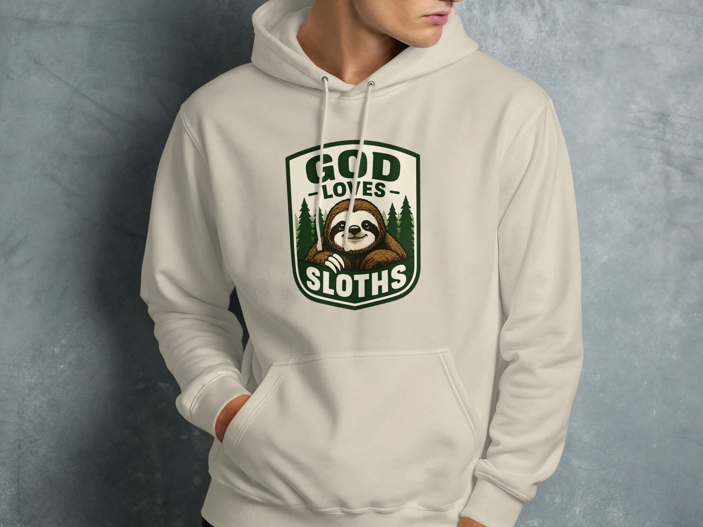Cream hoodie with "God Loves Sloths" text and sloth graphic.