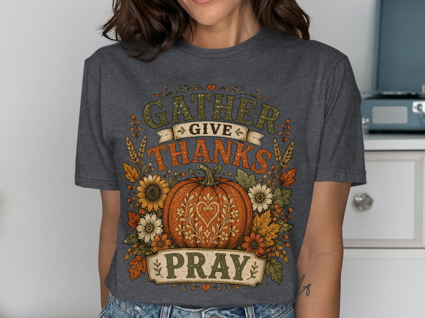 Dark gray t-shirt with "Gather, Give Thanks, Pray" and autumn harvest graphics.