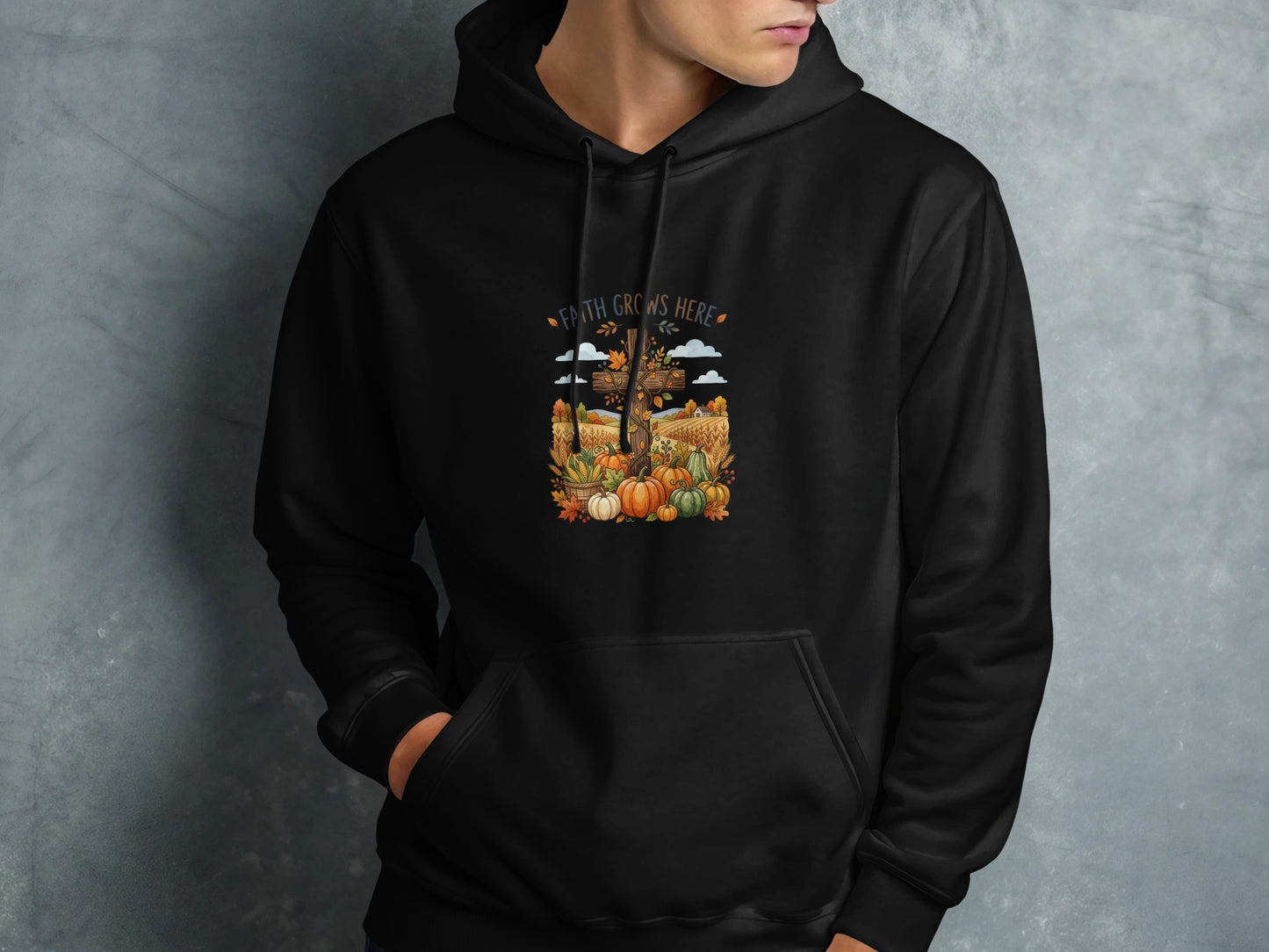 Black hoodie with "Faith Grows Here" text and a fall harvest scene.