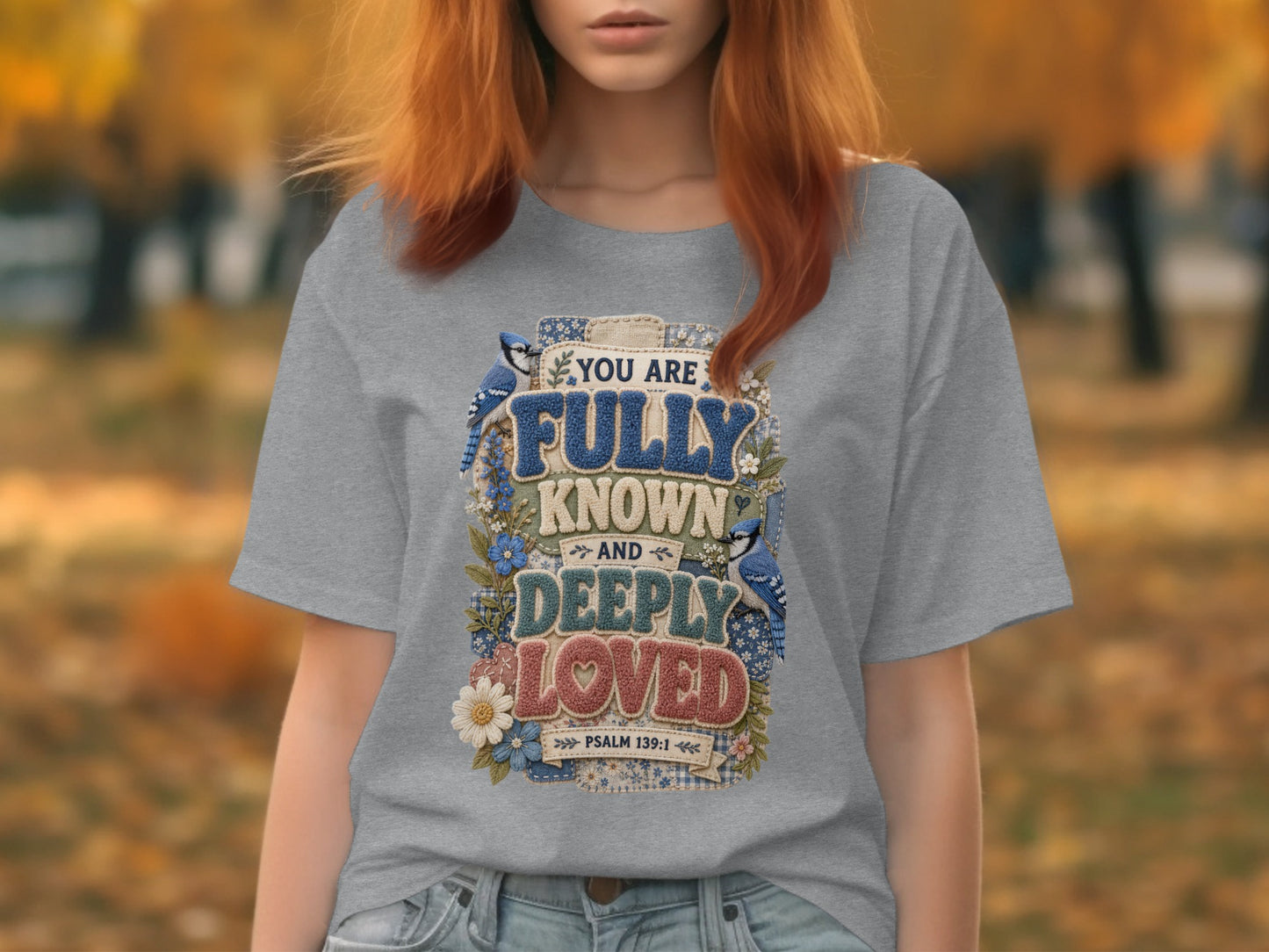 Grey t-shirt with "You are fully known and deeply loved" scripture design.