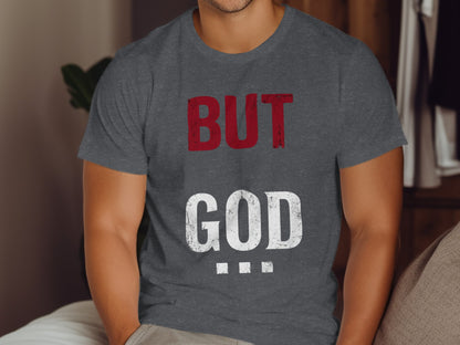 Dark grey t-shirt with red "BUT" and white "GOD" text.