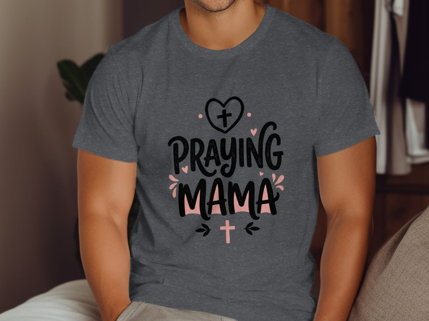 Dark gray t-shirt with "Praying Mama" text and cross graphics.