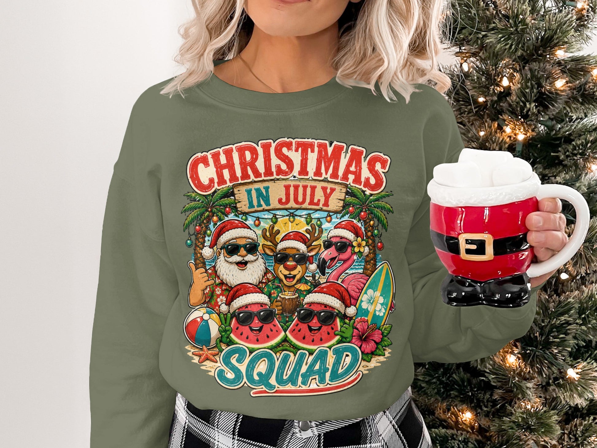 Crewneck sweatshirt with "Christmas in July" text, tropical scene, Santa, reindeer, and flamingo.
