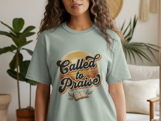 Light green t-shirt with "Called to Praise" text and open book graphic.