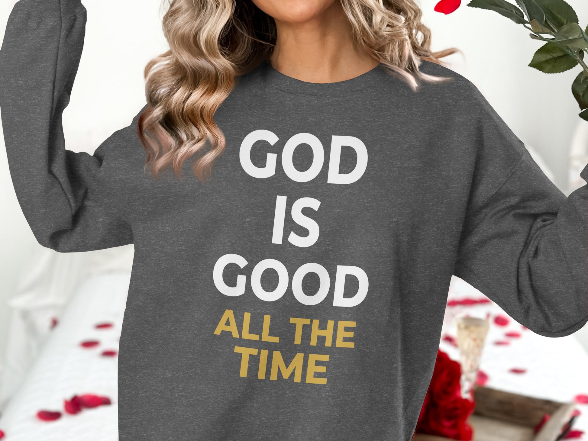 Dark gray sweatshirt with "God Is Good All The Time" text.