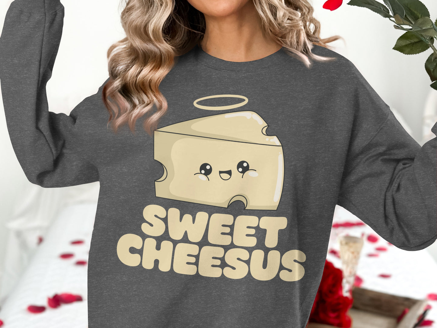 Dark gray sweatshirt with "Sweet Cheesus" text and a smiling cartoon cheese slice.