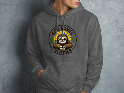 Grey hoodie featuring a circular logo with a smiling sloth and text "God Loves Sloths".