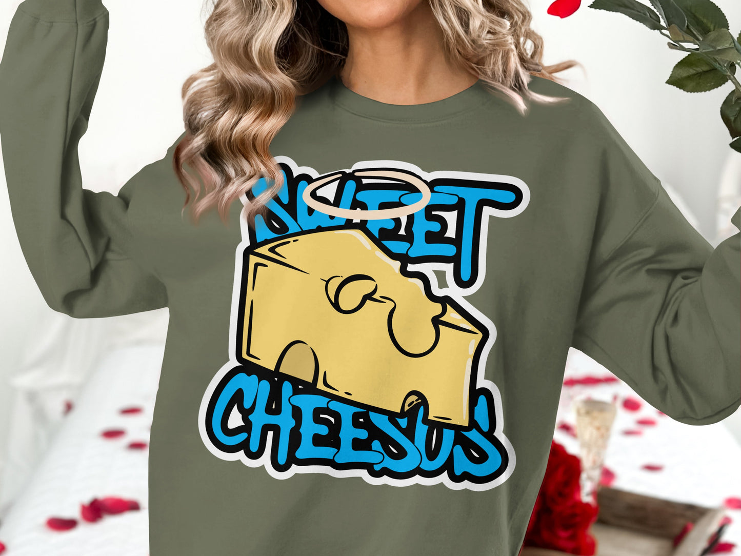 Olive green sweatshirt with "SWEET CHEESUS" text and a cartoon cheese wedge.