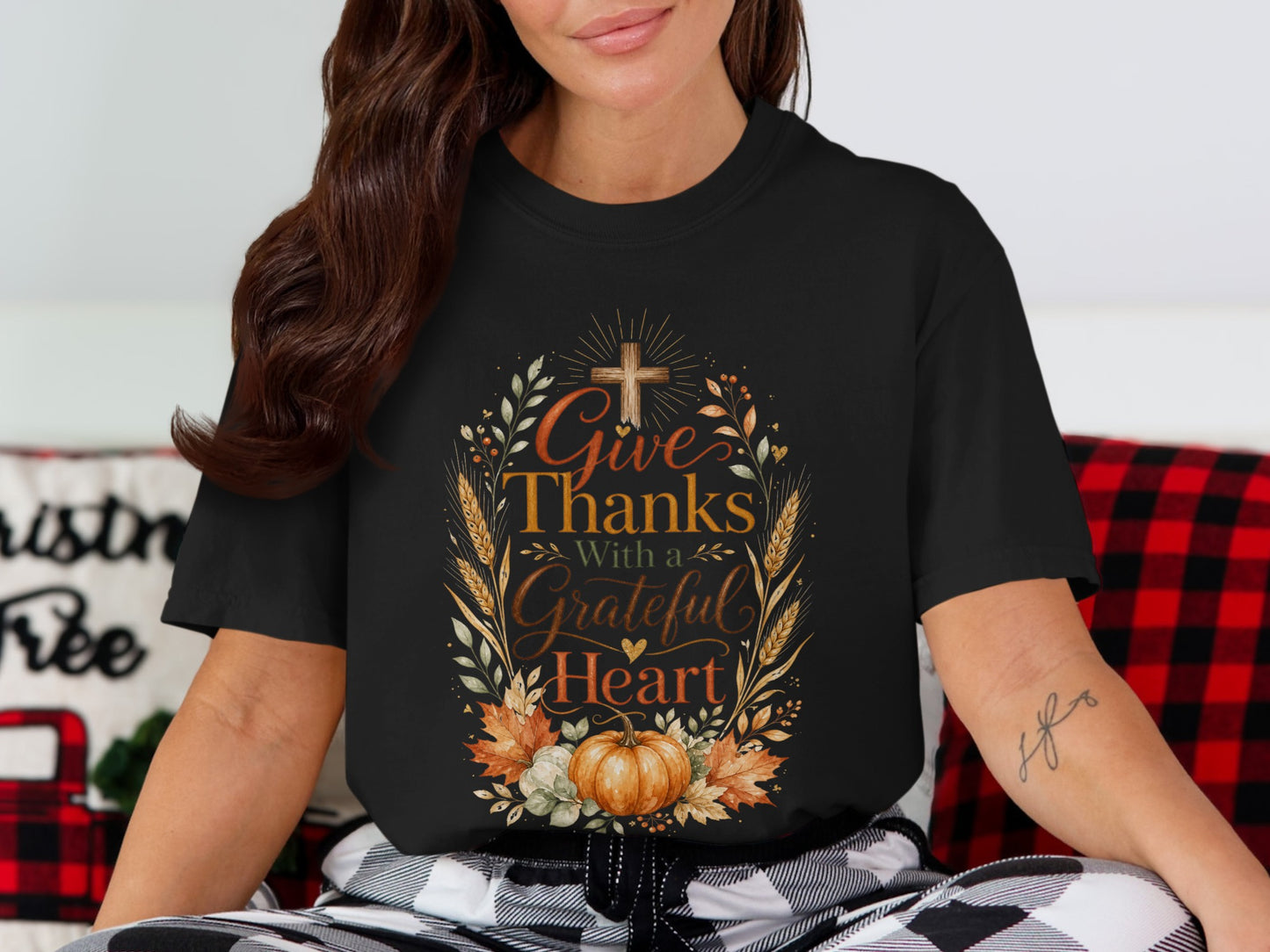 Black t-shirt with "Give Thanks With a Grateful Heart" in decorative text and fall motifs.