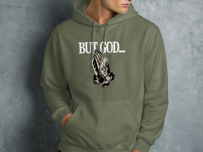Hoodie with "BUT GOD..." text and praying hands graphic.