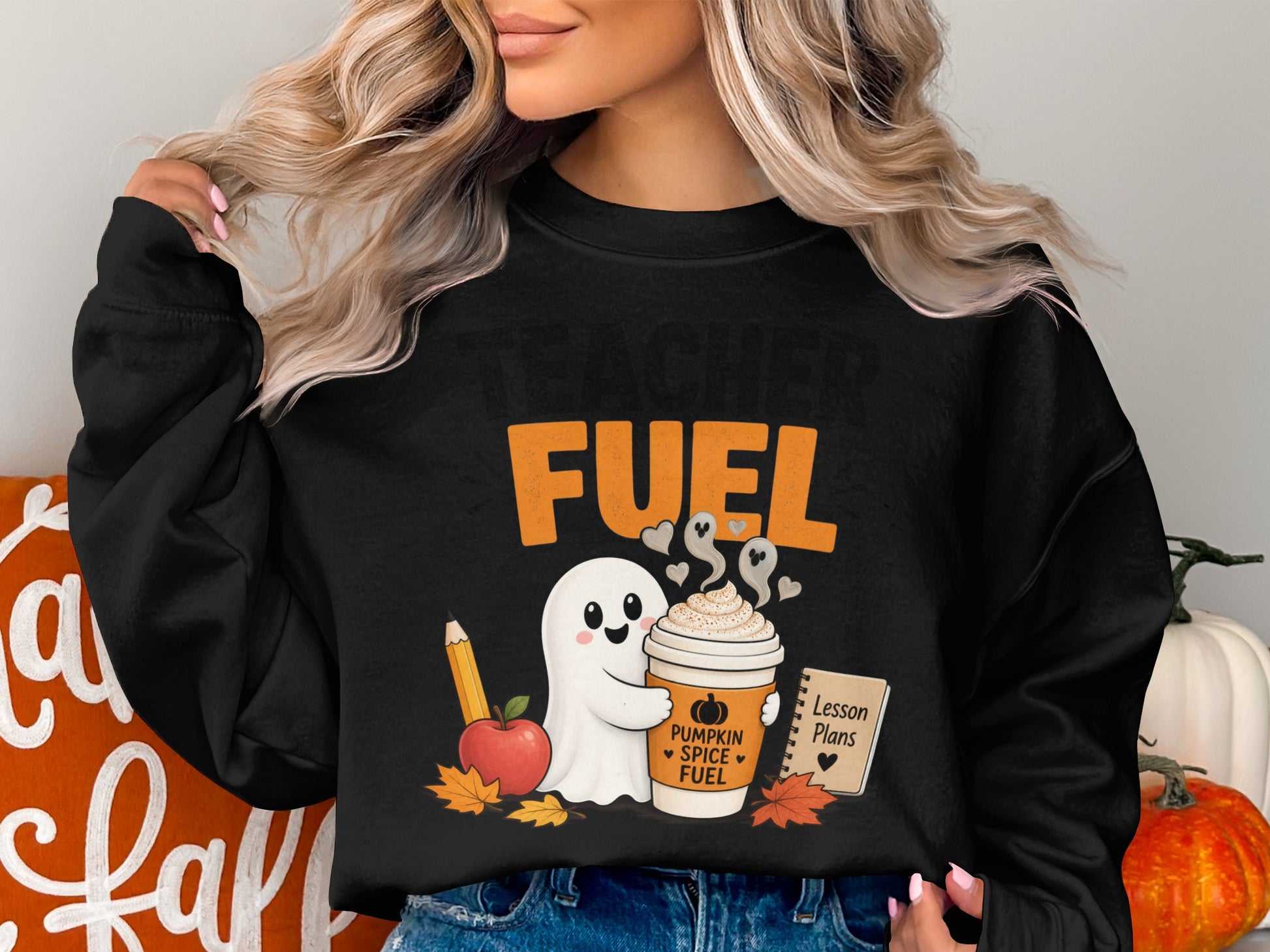 Black sweatshirt with ghost, pumpkin spice fuel, and lesson plans graphic.