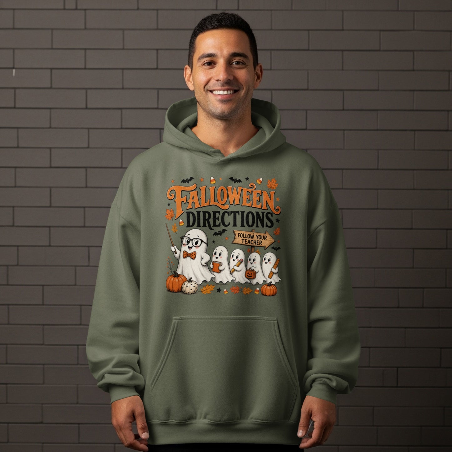 Hoodie with Halloween ghosts graphic that says "Falloween Directions Follow Your Teacher".