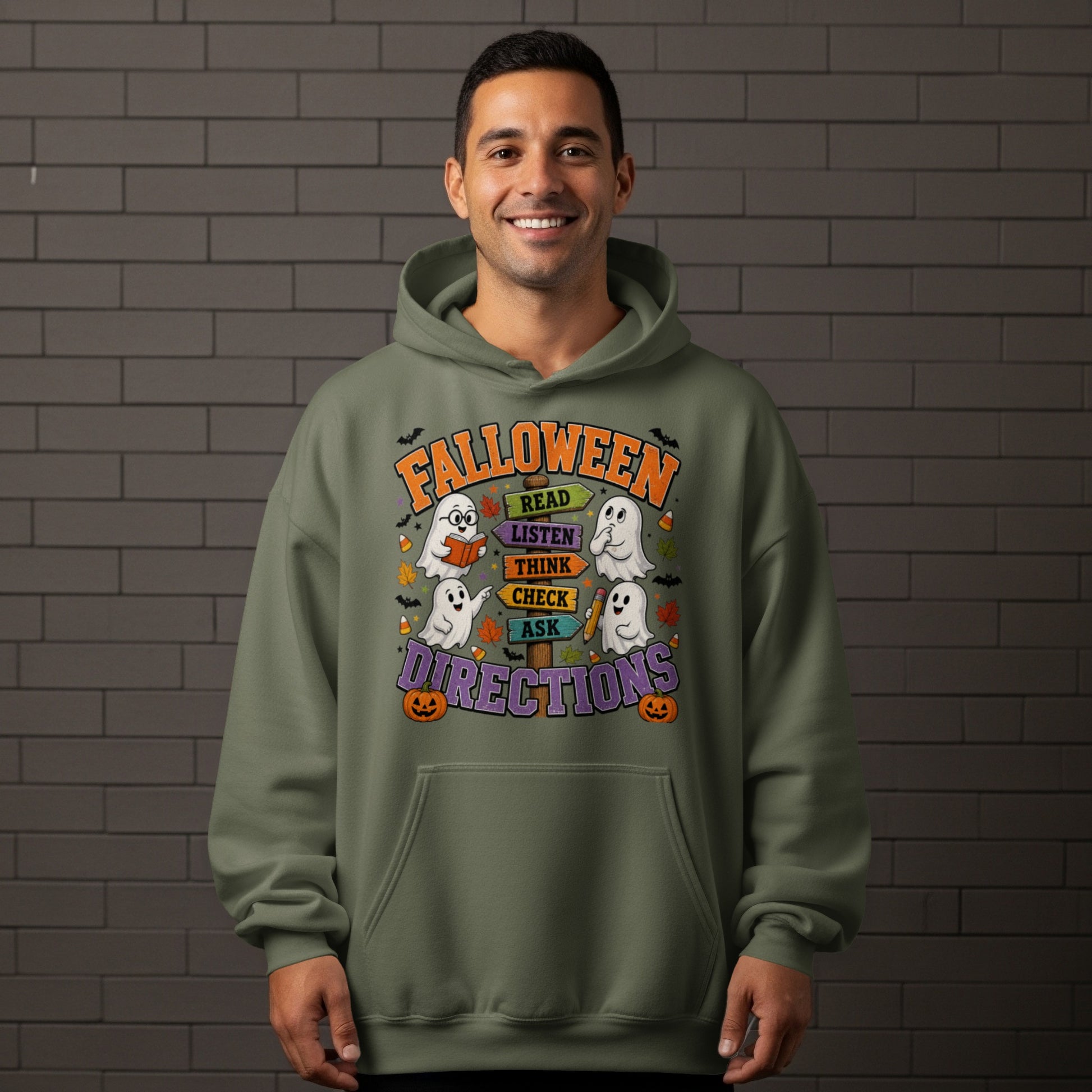 Green hoodie with "Falloween Directions" text and cartoon ghosts on a signpost.