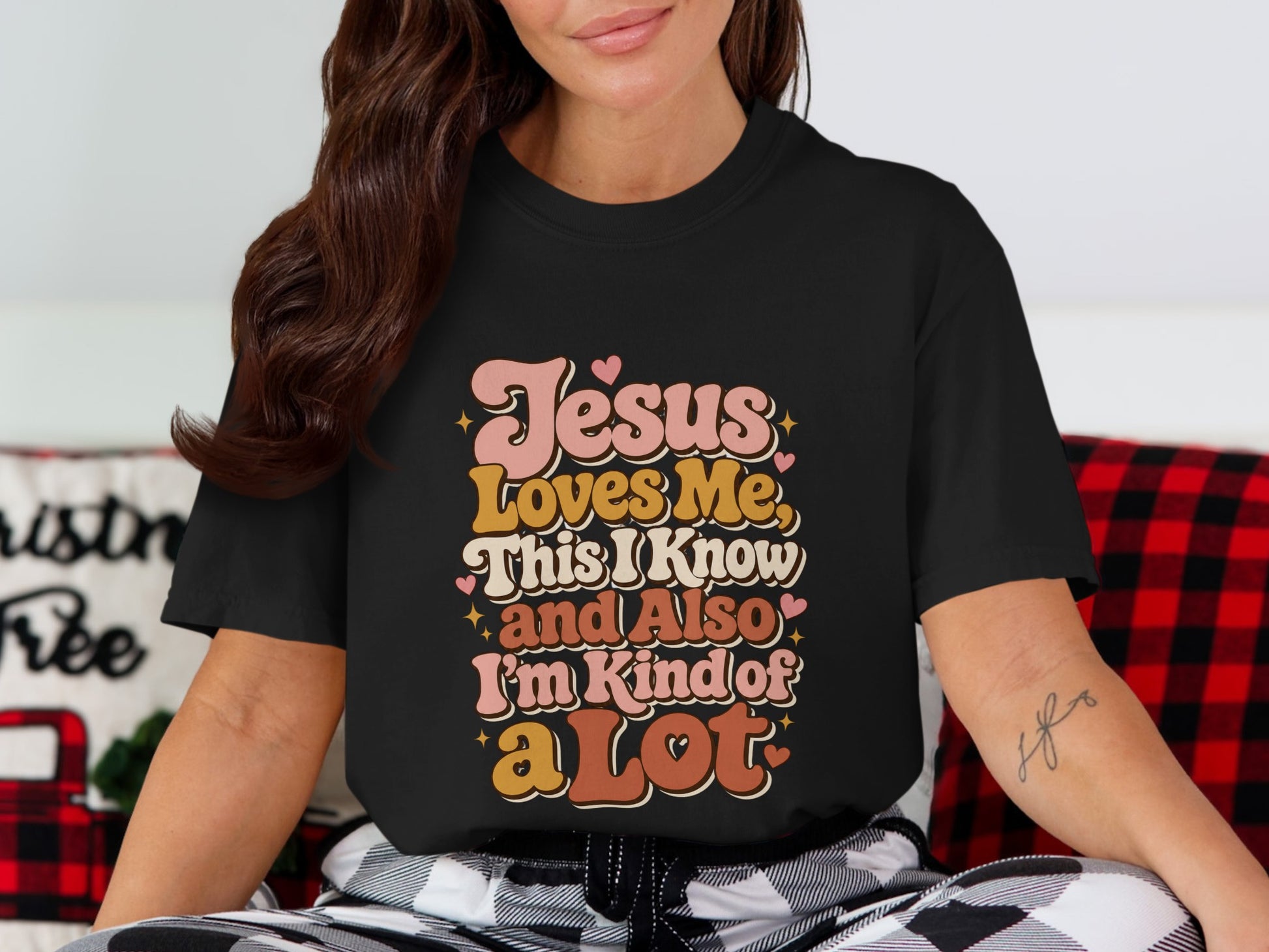 Black t-shirt with text "Jesus Loves Me, This I Know and Also I'm Kind of a Lot".