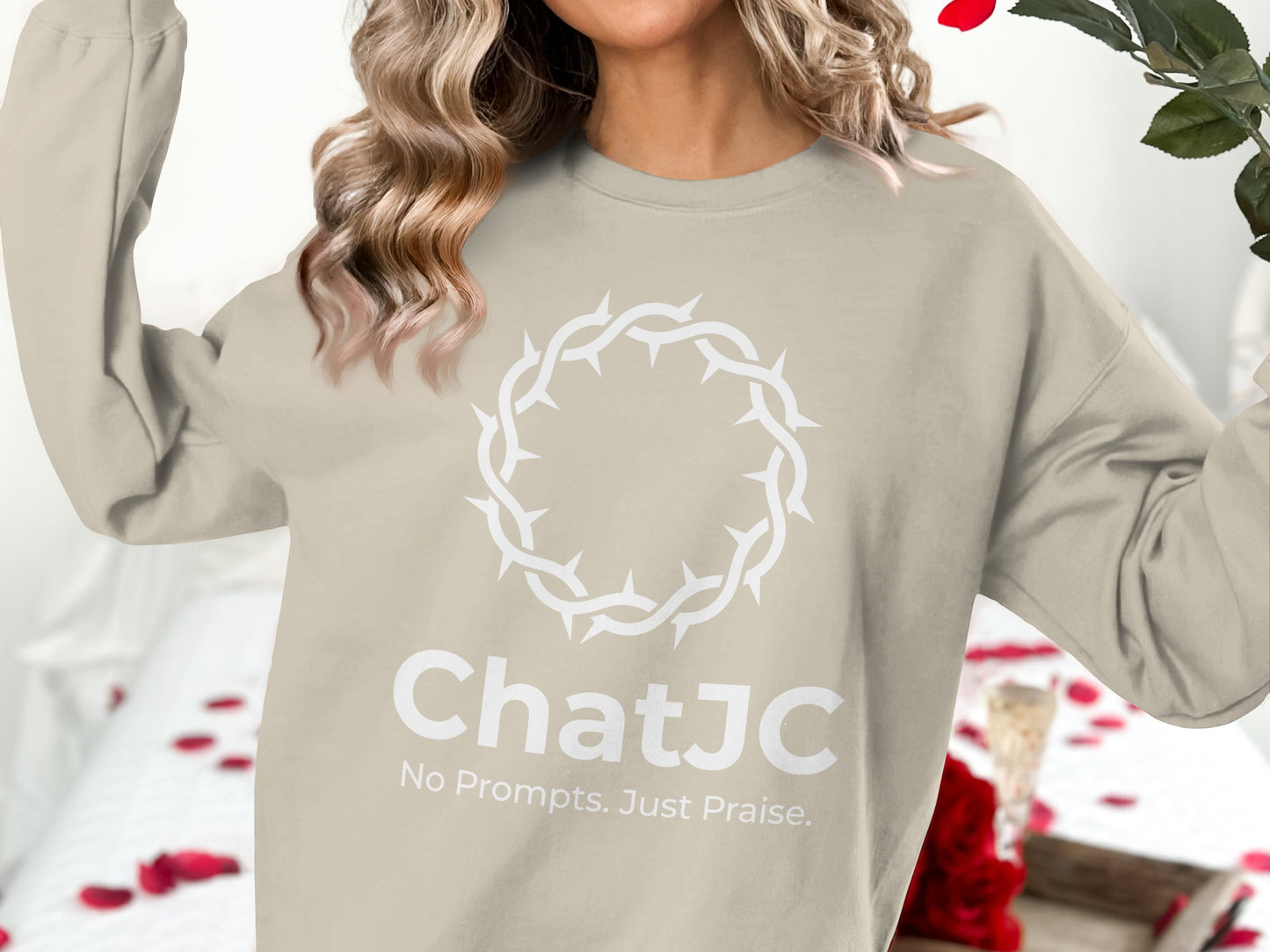 Light beige crewneck sweatshirt with white "ChatJC" and "No Prompts. Just Praise." text and a crown of thorns graphic.