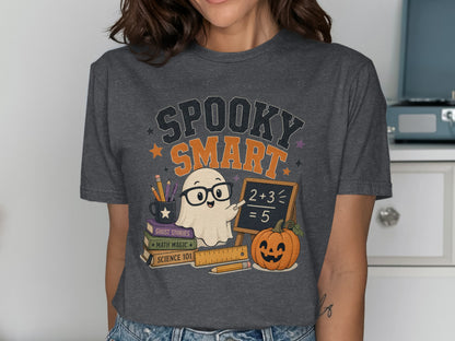 T-shirt graphic with "Spooky Smart" text, ghost, pumpkin, and books.