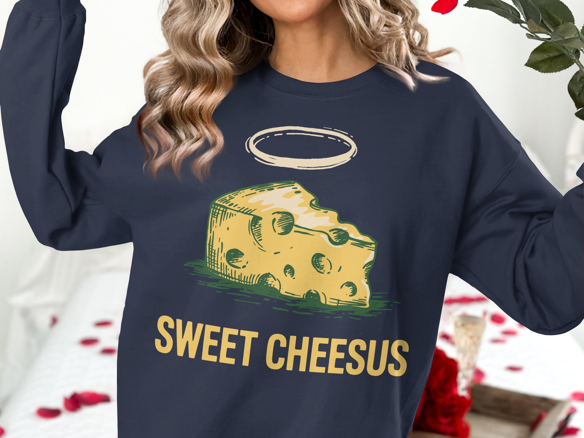 Navy sweatshirt with "Sweet Cheesus" text and a haloed cheese slice graphic.