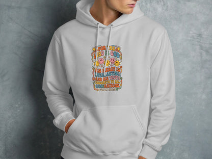 White hoodie with colorful "PSALM 100:5" text and smiley faces.
