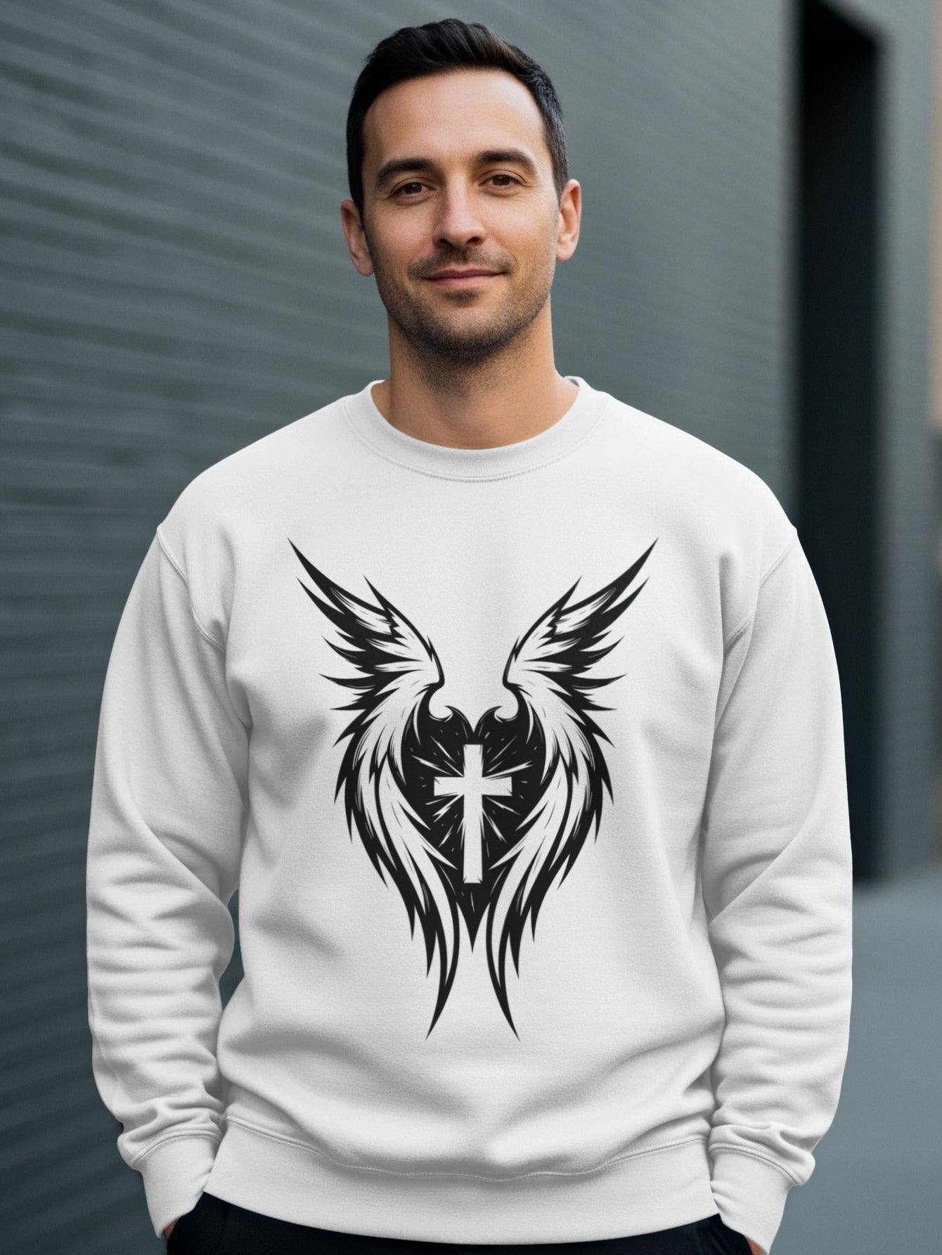 White sweatshirt with black winged cross graphic.