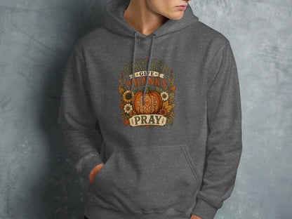 Dark grey hoodie with "Gather, Give Thanks, Pray" text and floral pumpkin design.