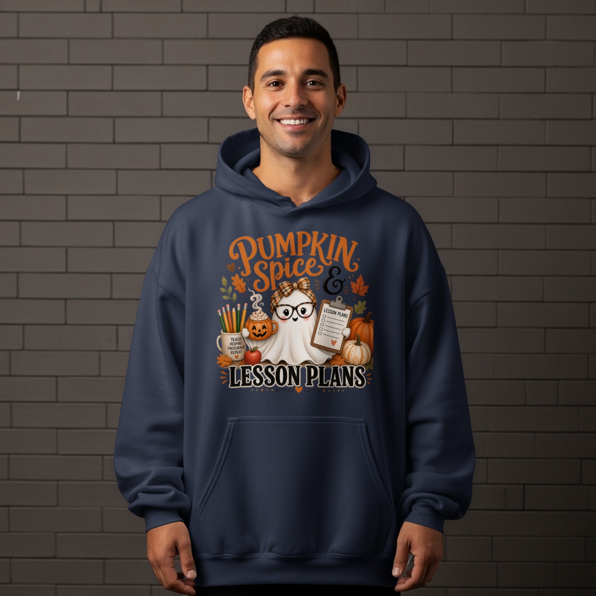 "Pumpkin Spice & Lesson Plans" text on a navy hoodie with a ghost graphic.