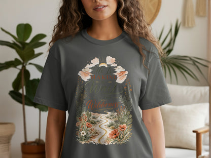 T-shirt with the phrase "He Is Making a Way in the Wilderness" and desert floral design.