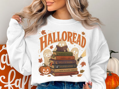 White sweatshirt with "Halloread" text, ghosts, and stacked Halloween books.