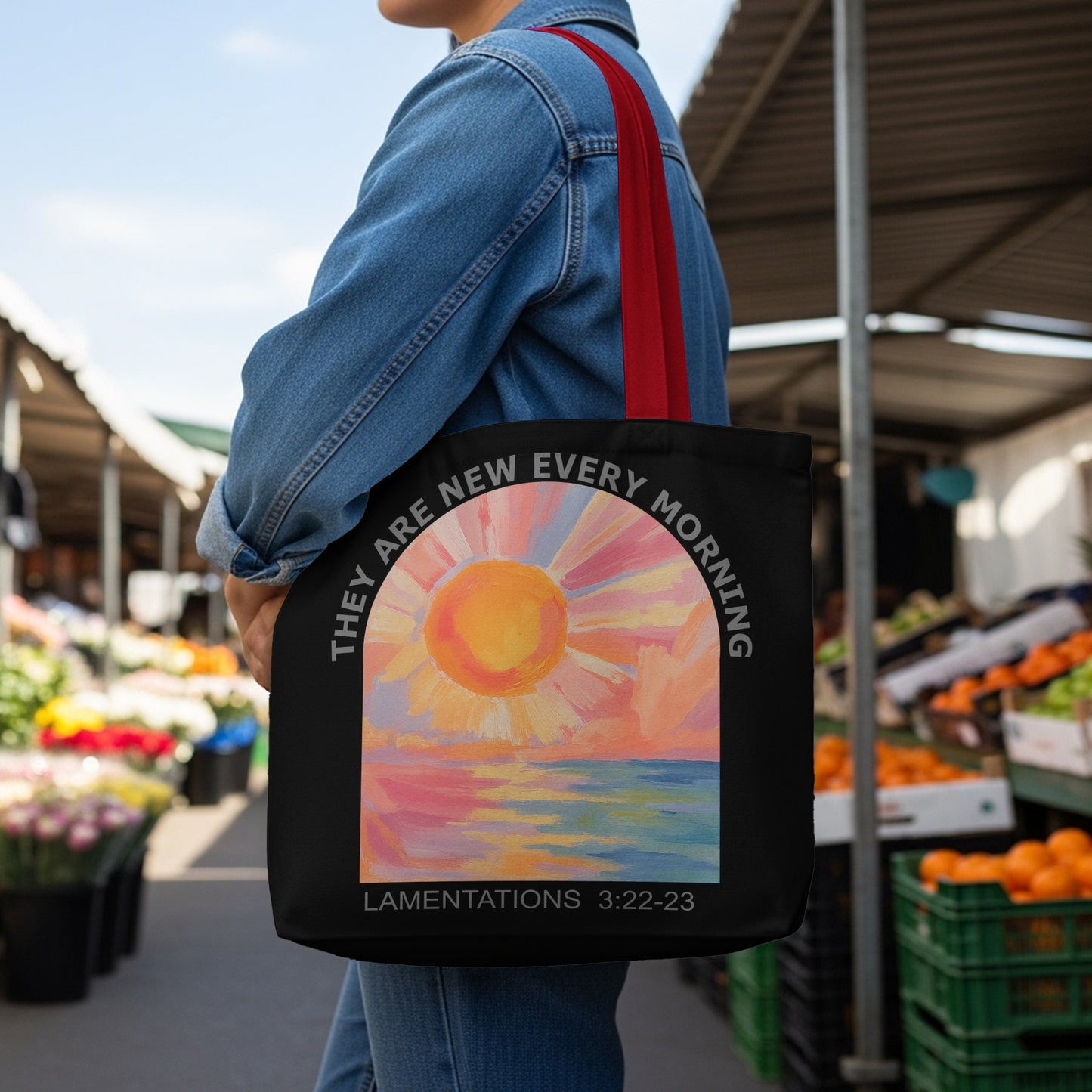 Black tote bag with sun and ocean art, "They are new every morning" and Lamentations 3:22-23.