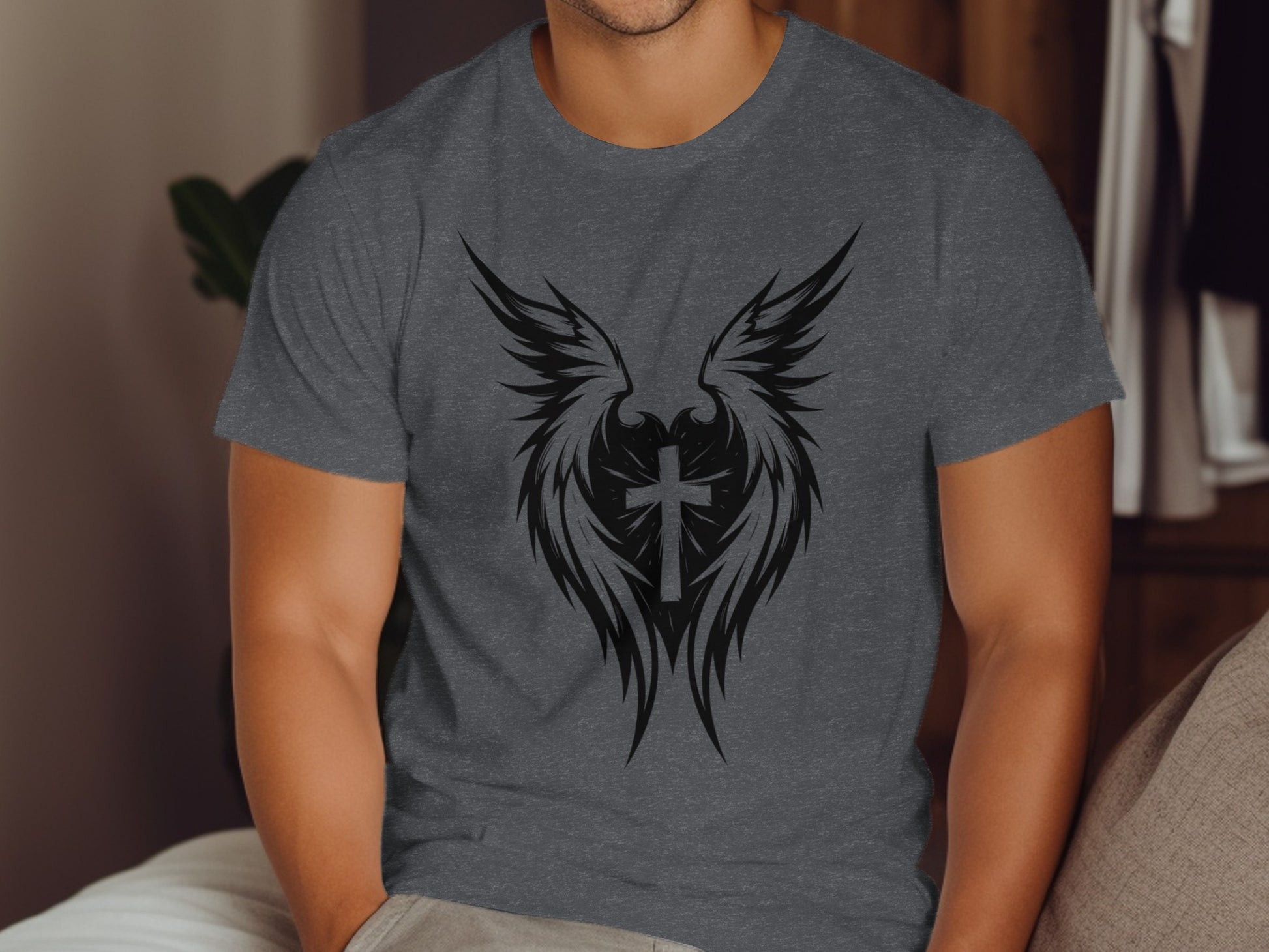 Dark gray t-shirt with a black tribal cross and wing design.