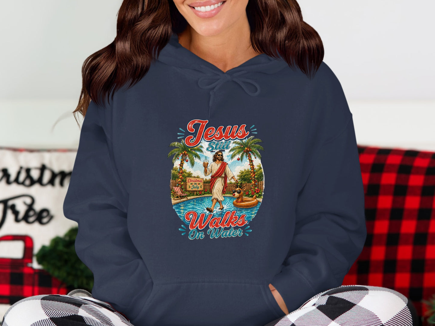 Jesus still walks on water graphic on a navy hoodie.