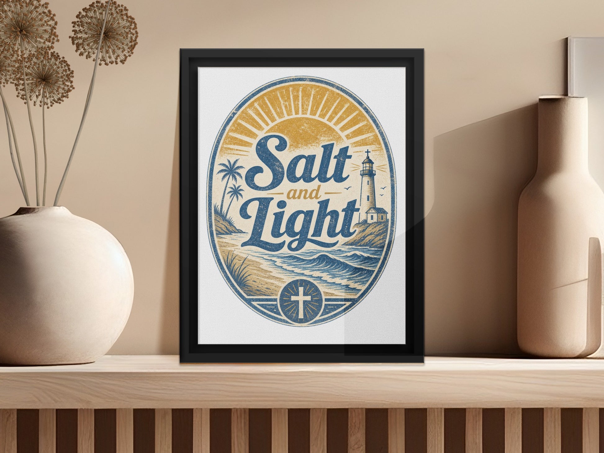 Framed artwork with "Salt and Light" text, lighthouse, ocean, and Christian cross.