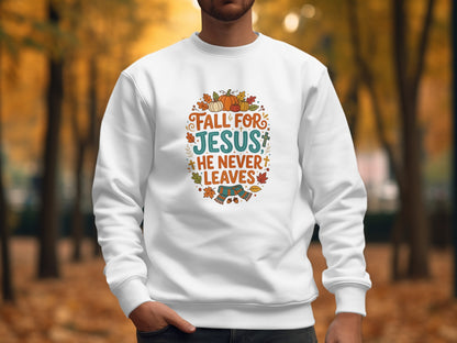 White sweatshirt with "Fall for Jesus, He Never Leaves" graphic.