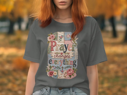 Gray t-shirt with "Prayer changes everything" in a patchwork heart design.