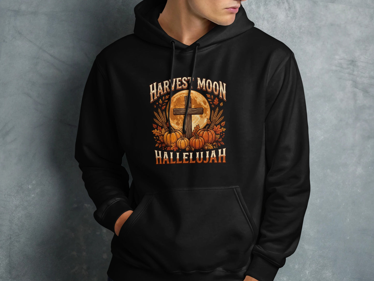 Black hoodie with Harvest Moon Hallelujah text and fall graphic.