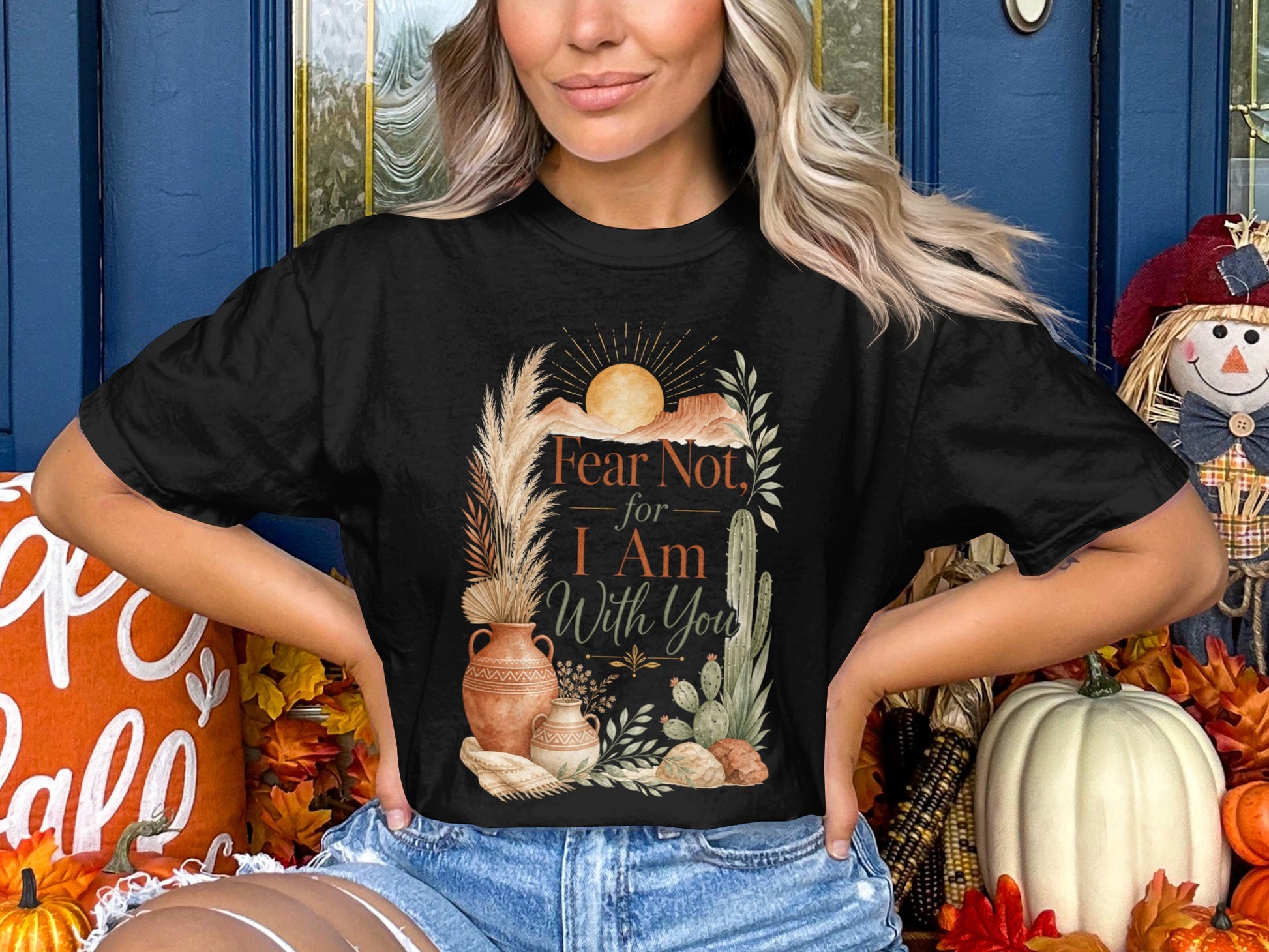Black t-shirt with "Fear Not, for I Am With You" text and desert flora design.