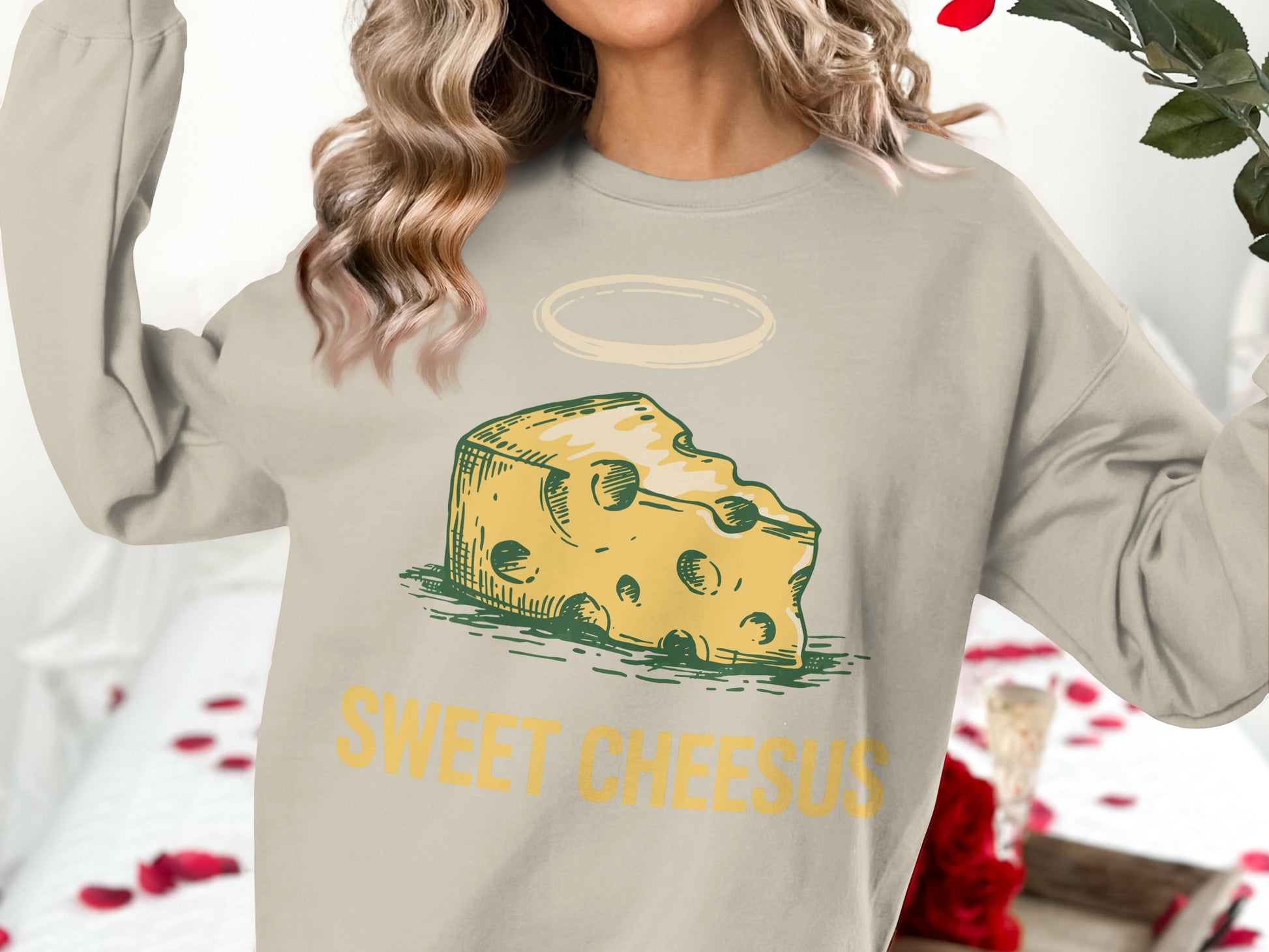 Crewneck sweatshirt with "Sweet Cheesus" text and a haloed slice of Swiss cheese.