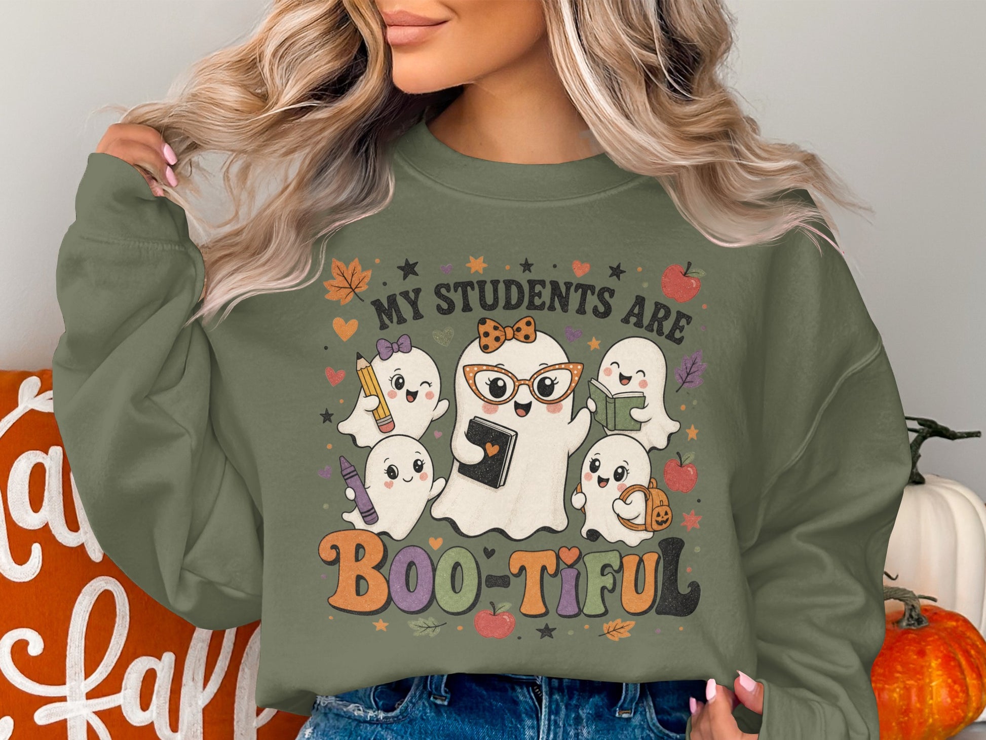 Green sweatshirt with ghosts and text "MY STUDENTS ARE BOO-TIFUL".