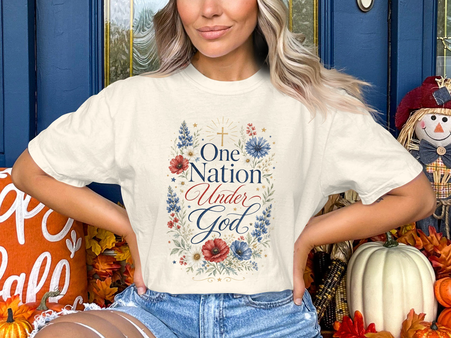 Cream t-shirt with floral design and text "One Nation Under God".