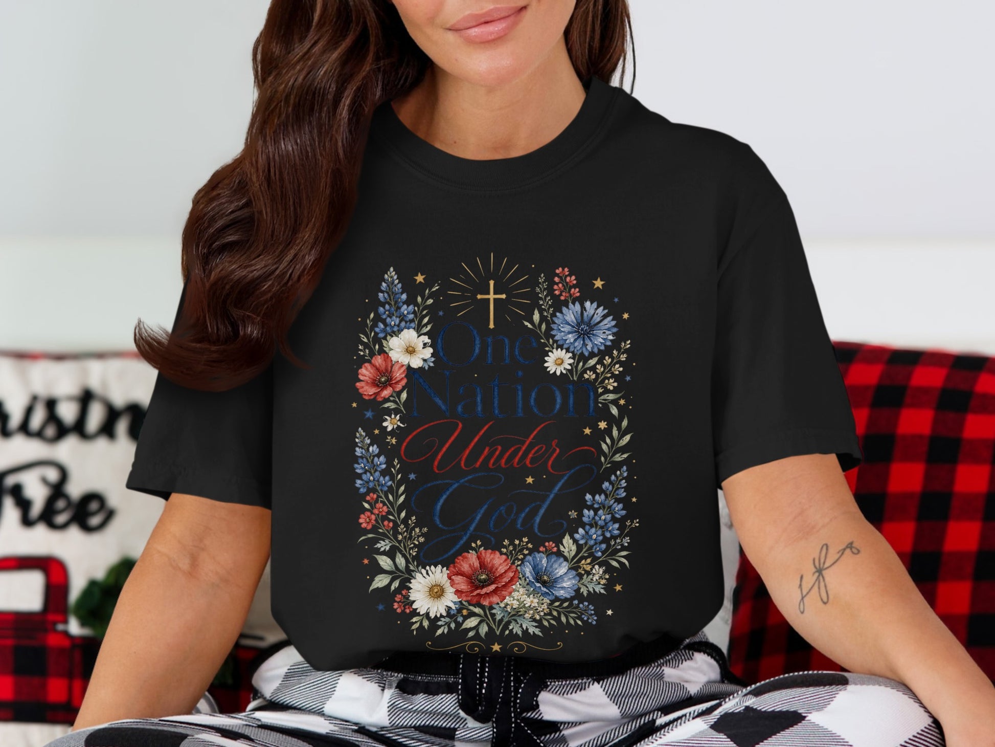 Black t-shirt with "One Nation Under God" in patriotic colors and floral wreath.