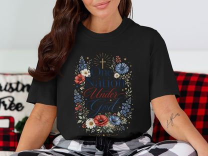 Black t-shirt with "One Nation Under God" in patriotic colors and floral wreath.